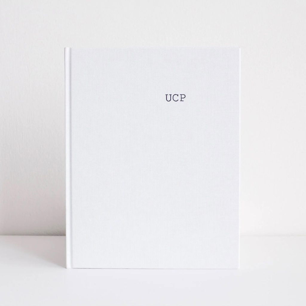 Photobook bound in Brillianta Calandré