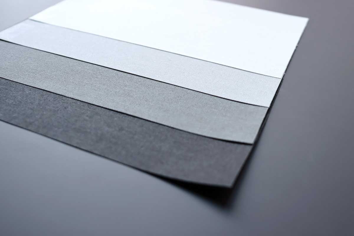 Recycled textile material for window roller blinds